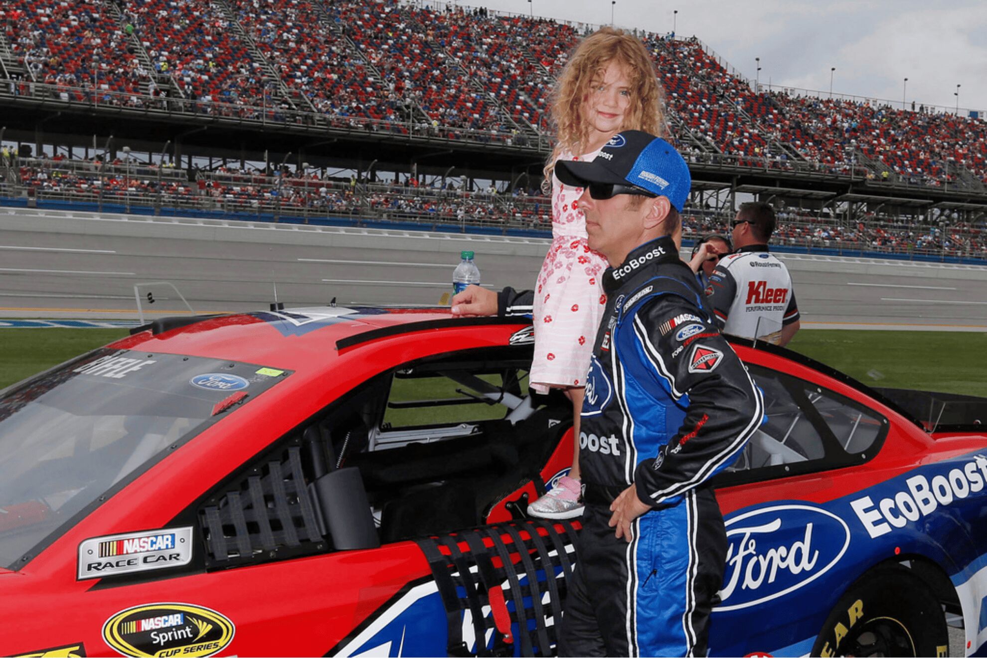 Former NASCAR driver Greg Biffle holds his daughter Emma Elizabeth